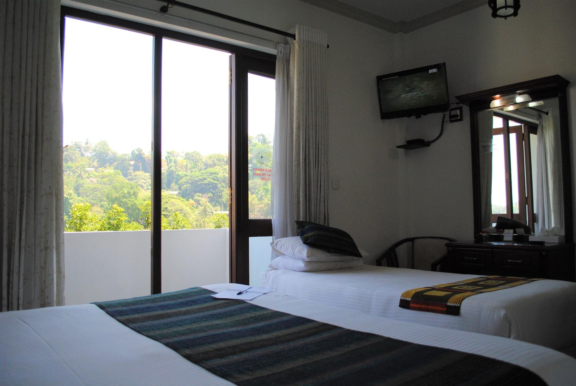 Hotel Yo Канди Екстериор снимка